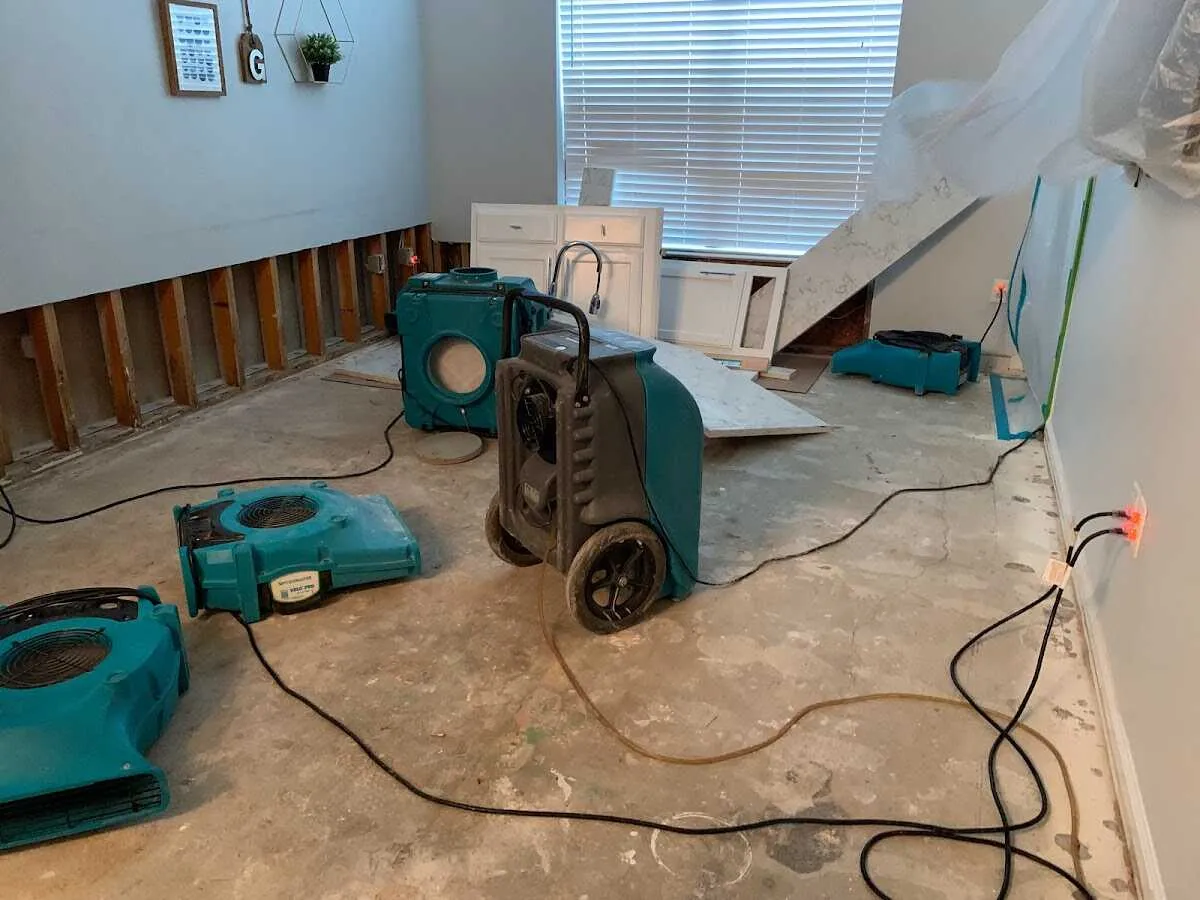 Dehumidifier in flood-cut room for Water Damage Restoration in Bountiful